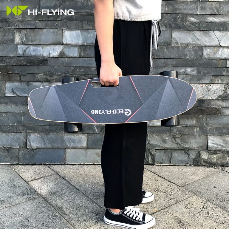 holding electros skateboard